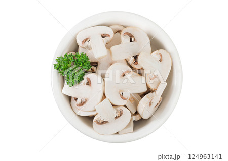 Fresh mushroom champignon slices in a ceramic bowl isolated on white background. Top view. Flat lay Fresh mushroom champignon slices in a ceramic bowl isolated on white background. Top view. Flat lay 124963141