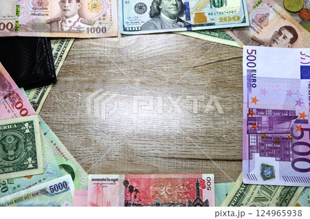 Banknotes of different countries dollars, euros, rubles on the table 124965938