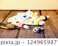 Tubes of acrylic paint lie on the table 124965987