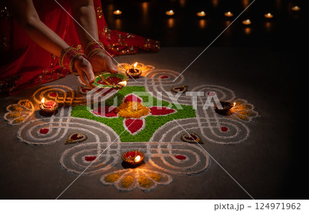 Diwali Traditions and Celebrations Around the World. 124971962