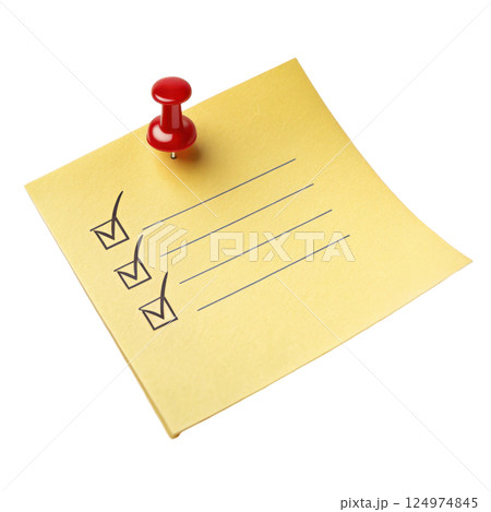 A yellow sticky note with a red push pin attached used to display important information 124974845