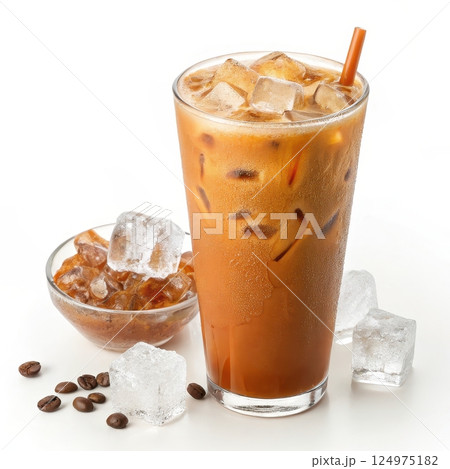 Orange Thai iced tea with a creamy sweet flavor and frothy texture served over ice in a refreshing glass 124975182