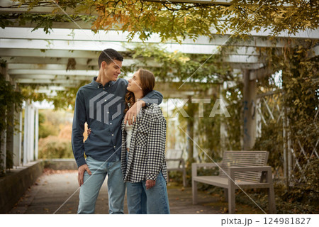 Young Cute Female Hugs Boyfriend. In Autumn Outdoor. Lovers Walking in Park. Attractive Funny Couple. Lovestory in Forest. Man and Woman. Cute Lovers in the Park. Family Concept. Happy Couple. Young Cute Female Hugs Boyfriend. In Autumn Outdoor. Lovers Walking in Park. Attractive Funny Couple. Lovestory in Forest. Man and Woman. Cute Lovers in the Park. Family Concept. Happy Couple. 124981827