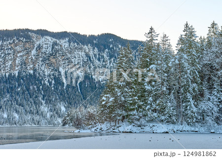 Mesmerizing Twilight Alpine Wonderland: Eibsee Lake Reflects Snow-Capped Zugspitze Mountain Amidst Illuminated Pine Forest Enchanting Winter Landscape Captures Serene Beauty of German Ski Resort at Mesmerizing Twilight Alpine Wonderland: Eibsee Lake Reflects Snow-Capped Zugspitze Mountain Amidst Illuminated Pine Forest Enchanting Winter Landscape Captures Serene Beauty of German Ski Resort at 124981862