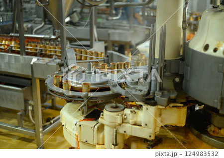 Automated industrial machinery in seafood processing plant Automated industrial machinery in seafood processing plant 124983532