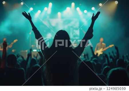 Concert celebration music venue live performance energetic atmosphere audience perspective community spirit Concert celebration music venue live performance energetic atmosphere audience perspective community spirit 124985030