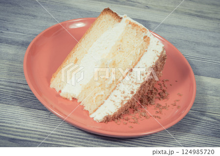 Sweet cake with different layers. Dessert for holidays or various occasions Sweet cake with different layers. Dessert for holidays or various occasions 124985720