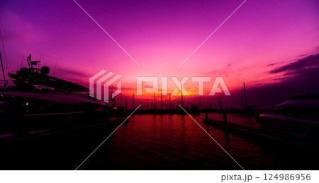 Beautiful view of marina and harbor with yachts and motorboats. 124986956