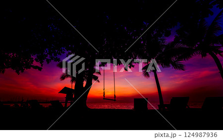 Beautiful tropical beach with palm trees. Sunrises and sunsets. Ocean. Beautiful tropical beach with palm trees. Sunrises and sunsets. Ocean. 124987936