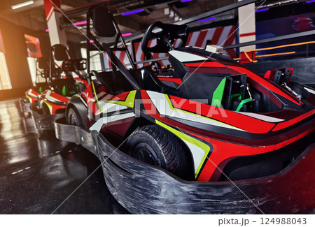 New electric go karts in the modern indoor racing track 124988043