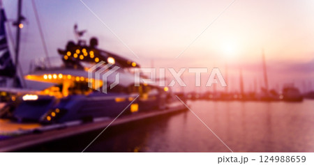 Beautiful view of marina and harbor with yachts and motorboats. Beautiful view of marina and harbor with yachts and motorboats. 124988659