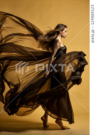 beautiful girl in long dress dancing beautiful girl in long dress dancing 124989123