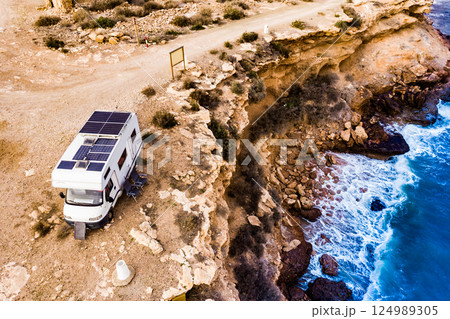 Camper on coast in Spain. Aerial view Camper on coast in Spain. Aerial view 124989305
