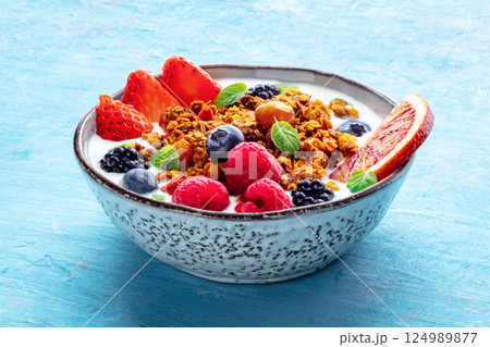 Granola with yogurt and fresh fruit. Organic gourmet muesli with ingredients 124989877