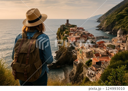 Scenic View of a Young Traveler Overlooking Vernazza, Cinque Terre, Italy 124993010