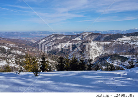 White scenery in Silesian Beskid range near European Szczyrk city in Poland 124993398