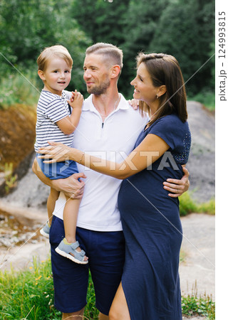 Happy Family Portrait With Pregnant Mom And Son Happy Family Portrait With Pregnant Mom And Son 124993815
