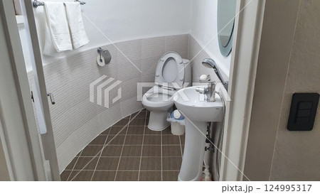 interior of a bathroom with toilet 124995317