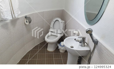 interior of a bathroom with toilet 124995324
