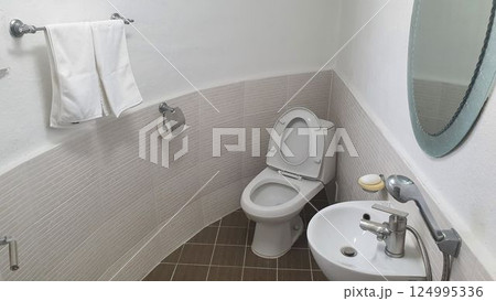interior of a bathroom with toilet interior of a bathroom with toilet 124995336
