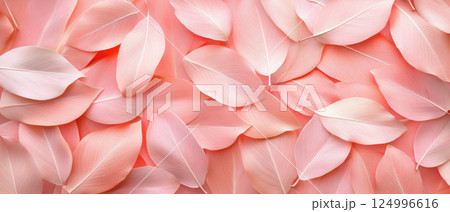 Soft pink tropical leaves create vibrant and serene layout, perfect for adding touch of nature to any design. gentle hues evoke calming atmosphere 124996616