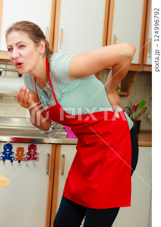 Woman suffering from backache back pain. 124996792