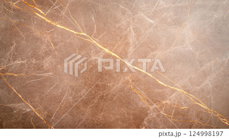 Warm brown marble with golden streaks creates luxurious and elegant surface, perfect for interior design and decor. This stunning texture adds depth and sophistication to any space 124998197