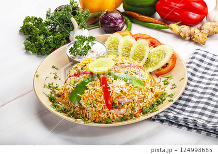 Indian chicken biryani rice with chicken 124998685
