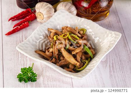 Asian cuisine roasted enoki mushrooms 124998771