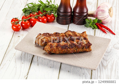 Chicken kebab minced meat and spices Chicken kebab minced meat and spices 124998881