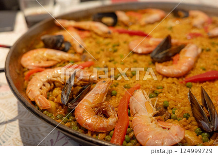 Delicious Seafood Paella with Shrimp and Mussels 124999729
