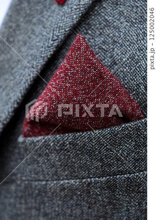 Knot fold pocket square adds bold flair to suit ensemble for stylish occasions. 125002046