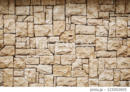 Abstract stone masonry texture background suitable for construction materials, architectural elements, and decorative designs 125002605