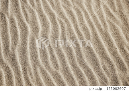 Natural sand texture background for outdoor design, travel, landscape or template use. Perfect for eco-friendly projects 125002607