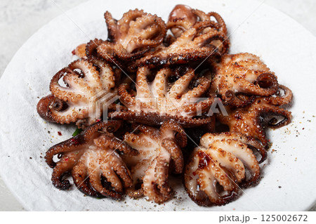Baby octopus grilled on a white plate, homemade, no people, Baby octopus grilled on a white plate, homemade, no people, 125002672