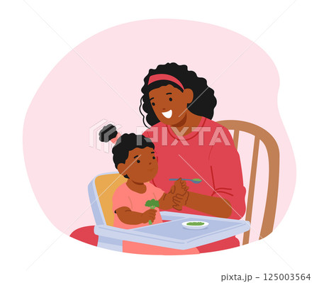 Mom teaching little toddler daughter to eat solid meal at table isolated on white background Mom teaching little toddler daughter to eat solid meal at table isolated on white background 125003564