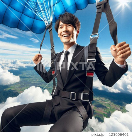 パラグライダーをするサラリーマン パラグライダーをするサラリーマン 125006401