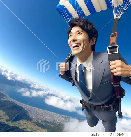 パラグライダーをするサラリーマン 125006405