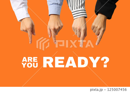 Job interview, Hands point toward the question Are you ready? on a vibrant orange background, emphasizing motivation for job interview preparation Job interview, Hands point toward the question Are you ready? on a vibrant orange background, emphasizing motivation for job interview preparation 125007456