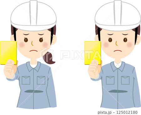 イエローカードを出す作業着の男女 125012180