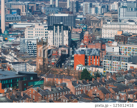 Aerial view of Liverpool showcasing St. Luke's Church, St. George's Hall, Radio City Tower, red brick houses, and modern architecture. Aerial view of Liverpool showcasing St. Luke's Church, St. George's Hall, Radio City Tower, red brick houses, and modern architecture. 125012418