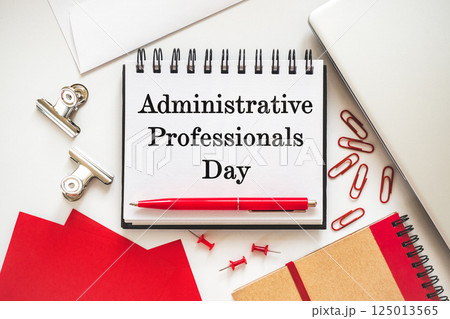 Happy Administrative Professionals Day. Notepad with congratulatory inscriptions Happy Administrative Professionals Day. Notepad with congratulatory inscriptions 125013565