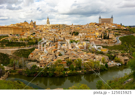 Toledo on Tagus River with Cathedral and Alcazar in spring Toledo on Tagus River with Cathedral and Alcazar in spring 125015925
