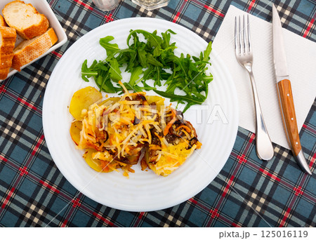 Russian french-style meat on a plate 125016119