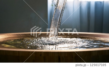 water flowing from faucet in bathroom, water flowing steadily from a chrome faucet into a clean, water flowing faucet, clean water basin, dripping water basin, water steadily dripping from a hole water flowing from faucet in bathroom, water flowing steadily from a chrome faucet into a clean, water flowing faucet, clean water basin, dripping water basin, water steadily dripping from a hole 125017105