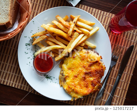Russian french-style meat on a plate 125017217
