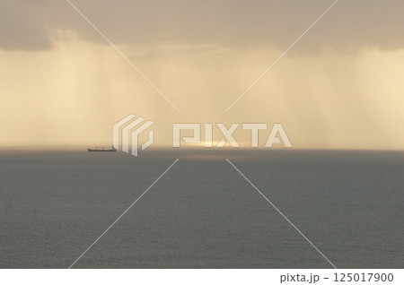 Raining cloud in the ocean morning Raining cloud in the ocean morning 125017900