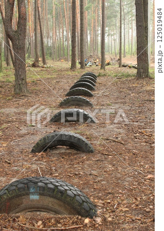 Car tires are lying on the ground. Resource reuse Car tires are lying on the ground. Resource reuse 125019484