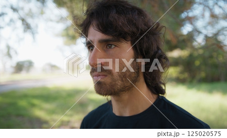 Angry Long Hair Man Thinks About Mistakes Made and Gets Nervous in Nature Angry Long Hair Man Thinks About Mistakes Made and Gets Nervous in Nature 125020575