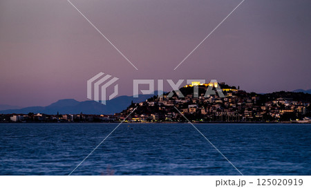 Evening scene of Astros town with old castle Greece Evening scene of Astros town with old castle Greece 125020919